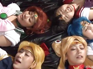 Japanese cosplay babes get on their knees and suck dick