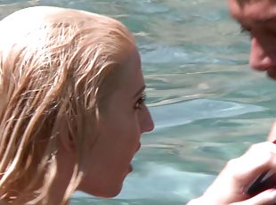 Brilliant tattooed blonde with big tits in bikini giving massive dick handjob