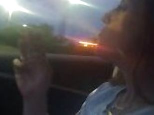 Pretty Milf Smoking Cigarettes In Car (What brand of cigarettes does she smoke)?