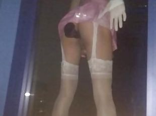 Femboy in pink schoolgirl outfit with a bad dragon dildo