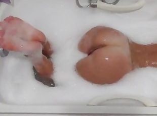 Hot girl touching herself in a bath