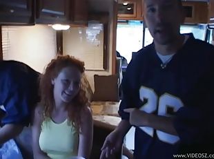 Busty redhead Audrey Hollander enjoying a gangbang