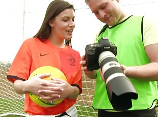 A sexy soccer girl fucks her coach on the field after practice