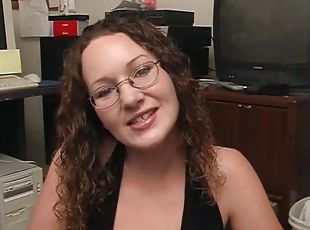 Home office handjob in POV from a cute chick in glasses