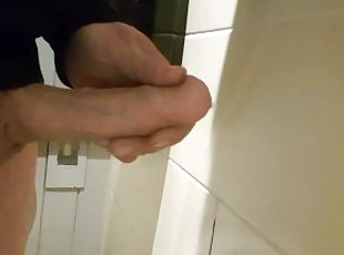 Cumshot in pub toilet