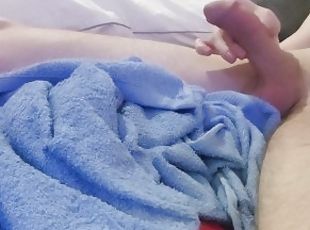 Young guy relaxing himself with a nice orgasm after stroking his big white dick. MOANING!