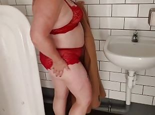 NZ MILF slut pisses in mens public toilet then clothing change for public display walk. Pt 1