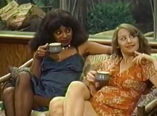 Retro porn video with interracial FFM threesome on the sofa