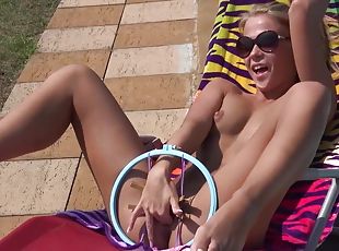 Young perky tits blonde teen gets wet by the pool outdoors