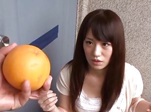 A hot Japanese girl with a pretty face gets pounded in a kitchen