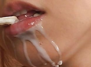 Kyoko Ayana practices sucking cock on a huge glass dildo