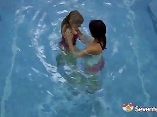 Two lesbians get dirty in a pool