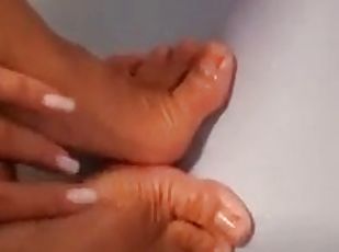 Foot fetish video in the bathroom with a lot of foam