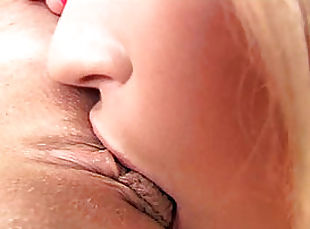 Close-up video of two blonde lesbians licking each others pussies