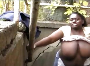 Mega busty black girl gets fucked on the street BBWMX