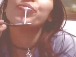 Young cutie plays with her pussy and eats her juices with a spoon and from a plate.