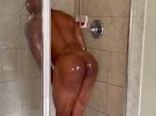 Chocolate muscle hunk takes a shower