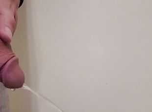 Pissing with an semi hard cock