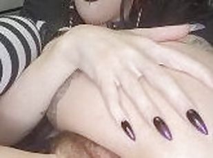 Petite goth fingers and teases both tight holes